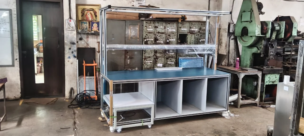 Wide workbench with open lower cubbies — original photograph