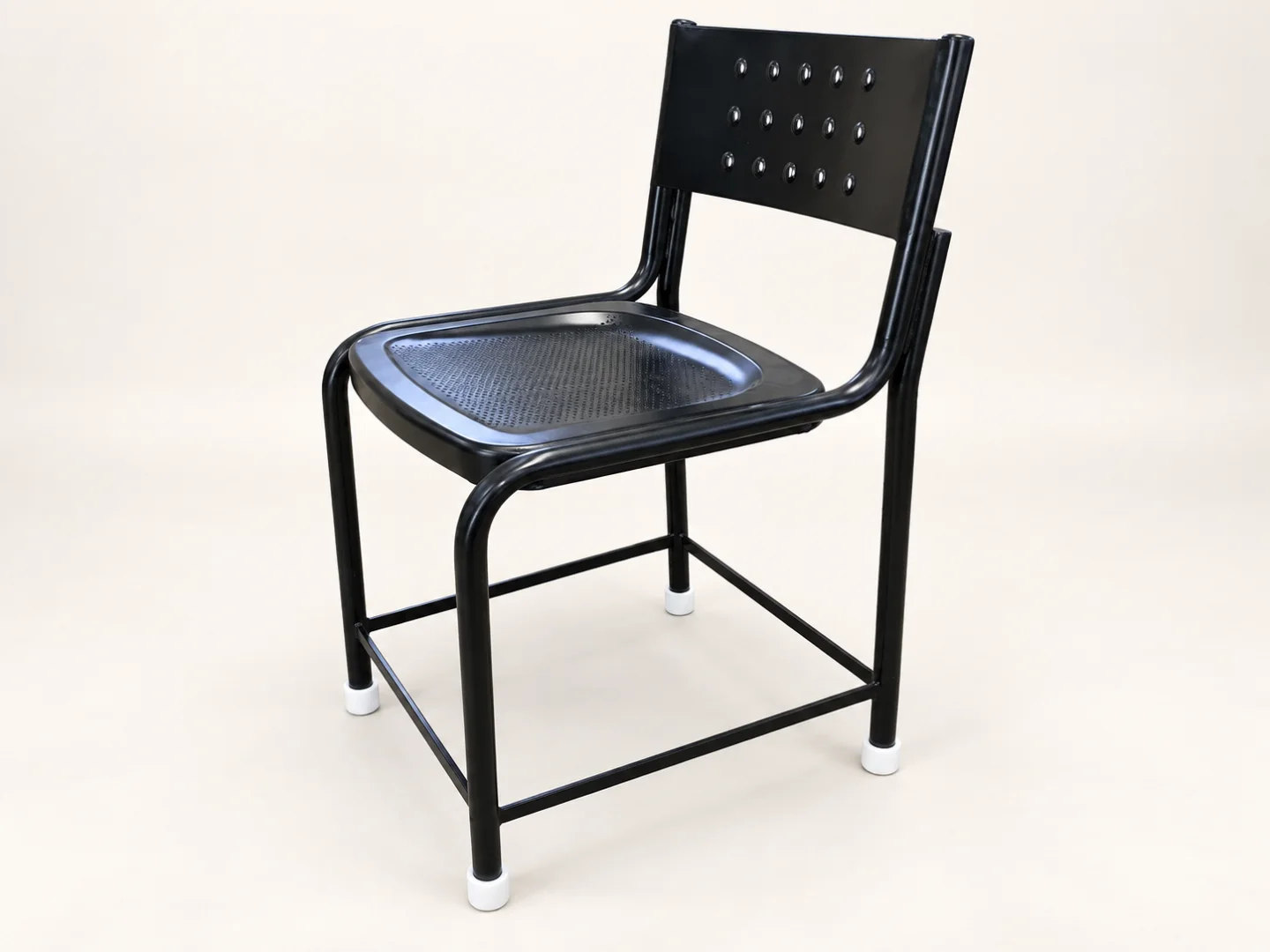 Black fixed-leg shop-floor chair — AI-retouched background